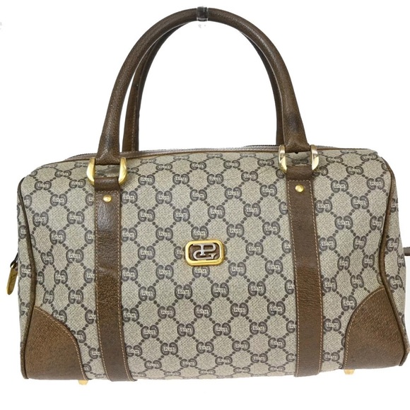 Chic Monogram Canvas and Leather Handbag - Picture 1 of 1